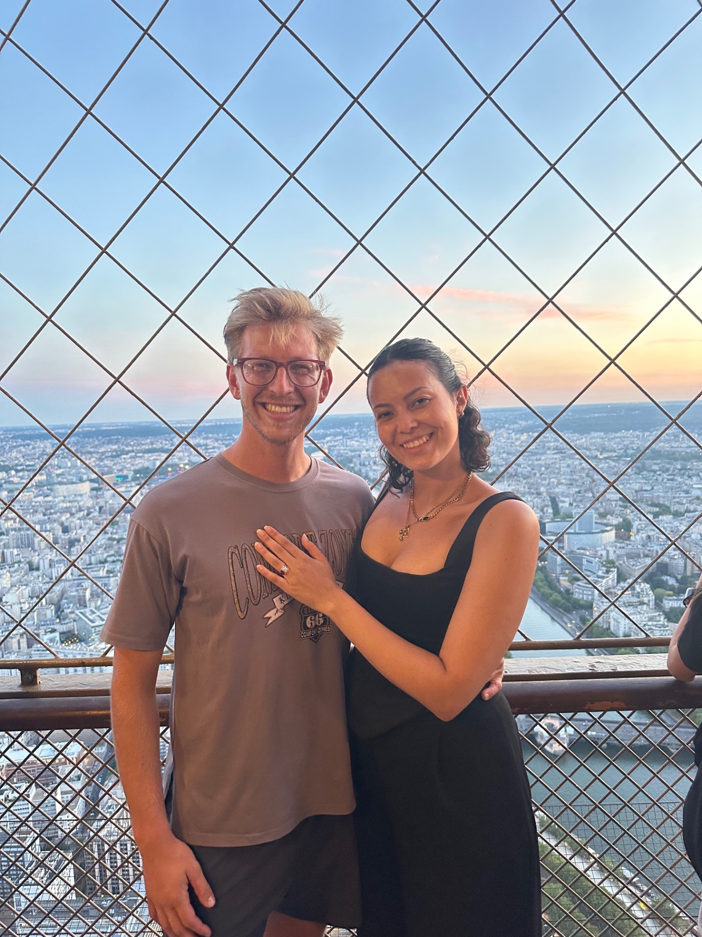 Jono & Monika at an lookout, showing Monika's engagement ring